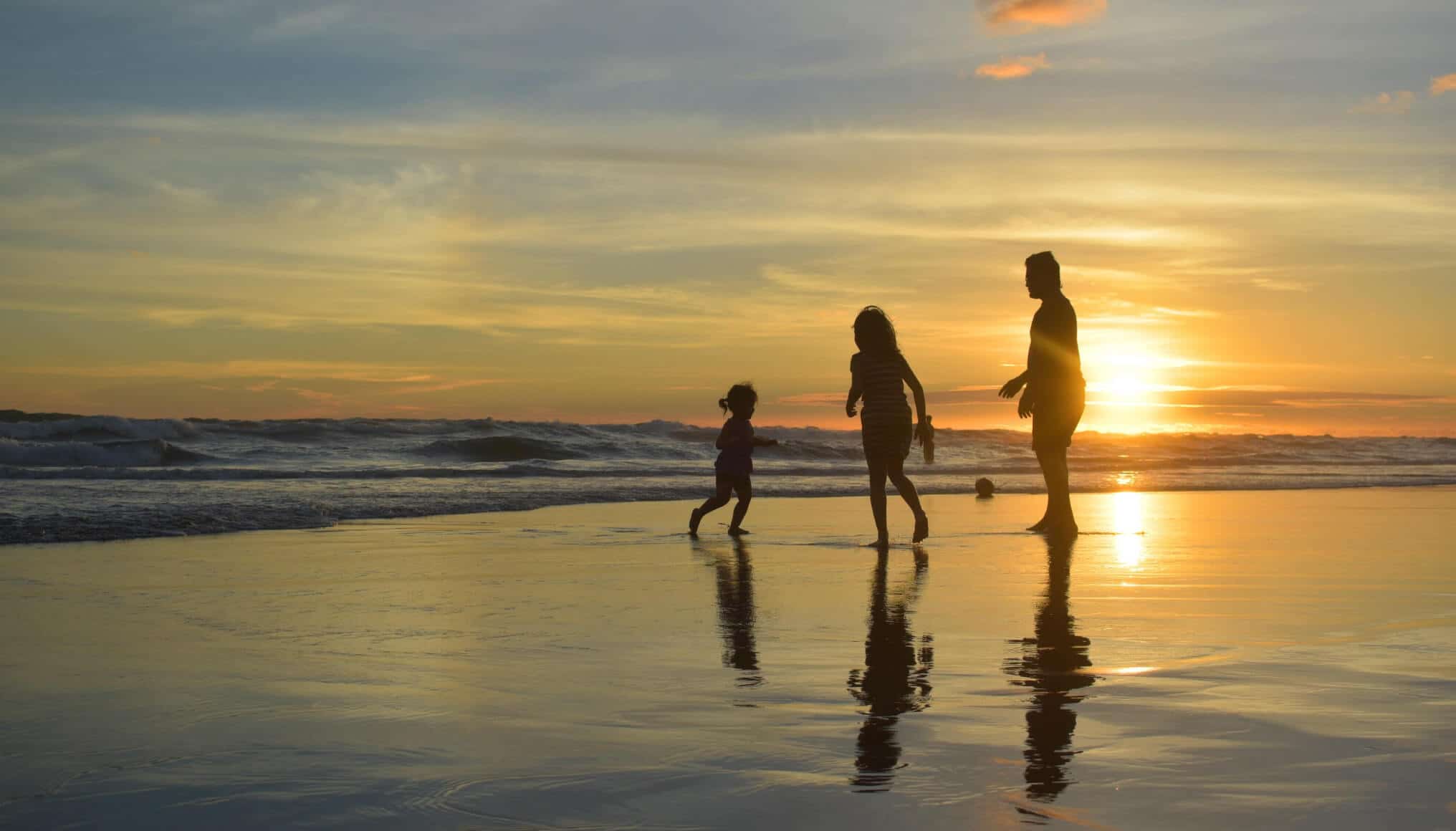family-beach-sunset